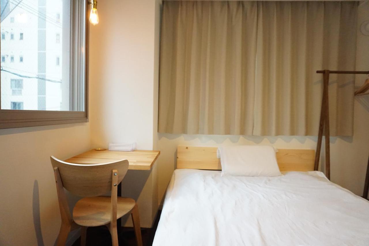 Beehive Hostel Осака Экстерьер фото